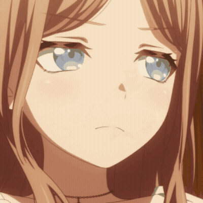 A Close Up Of A Girl 'S Face With Long Brown Hair And Blue Eyes GIF