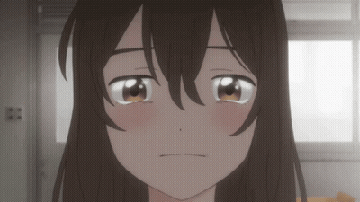 A Close Up Of A Girl 'S Face With Long Brown Hair GIF