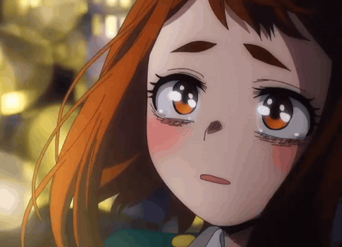 A Close Up Of A Girl 'S Face With Orange Hair GIF