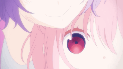 A Close Up Of A Girl 'S Face With Pink Hair GIF