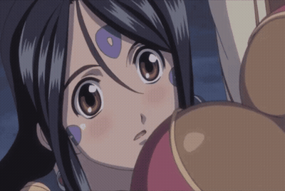 A Close Up Of A Girl 'S Face With Purple Circles On Her Forehead GIF
