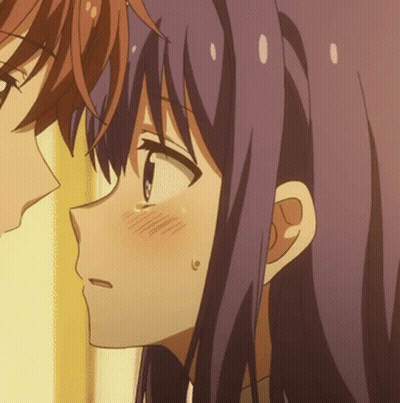 A Close Up Of A Girl 'S Face With Purple Hair GIF
