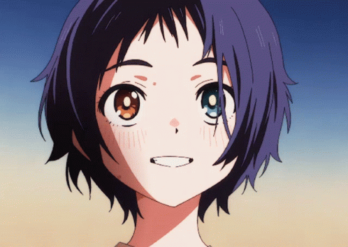 A Close Up Of A Girl 'S Face With Purple Hair GIF