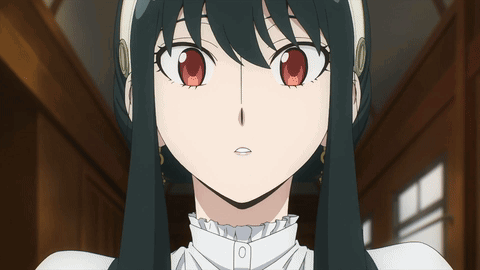 A Close Up Of A Girl 'S Face With Red Eyes And A White Shirt GIF