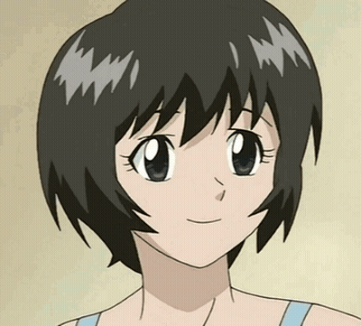 A Close Up Of A Girl 'S Face With Short Hair GIF