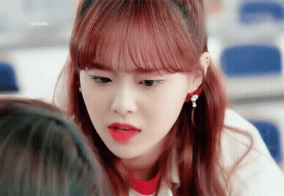 A Close Up Of A Girl 'S Face With The Word Ching On The Bottom Left GIF