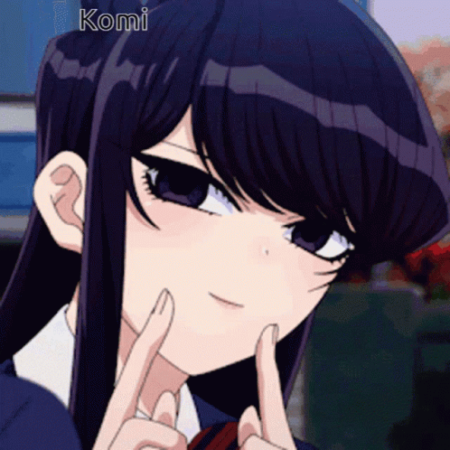 A Close Up Of A Girl 'S Face With The Word Komi On The Bottom GIF