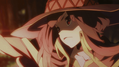 A Close Up Of A Girl Wearing A Red And Yellow Hat GIF