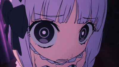 A Close Up Of A Girl With Big Eyes GIF