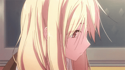A Close Up Of A Girl With Blonde Hair And Red Eyes GIF