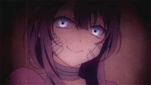 A Close Up Of A Girl With Blue Eyes And A Bandage Around Her Mouth GIF