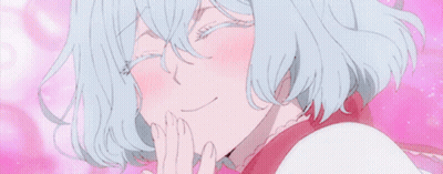 A Close Up Of A Girl With Blue Hair Covering Her Mouth With Her Hands . GIF