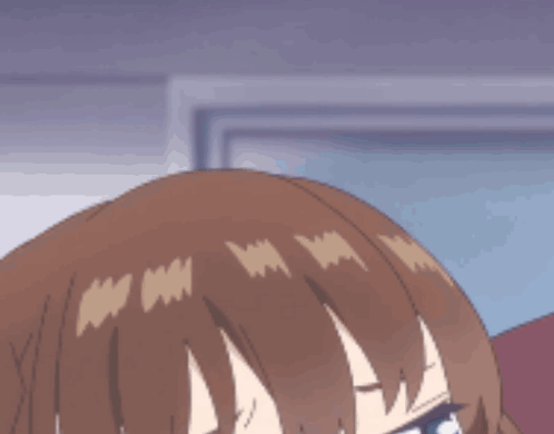A Close Up Of A Girl With Brown Hair And Green Eyes GIF
