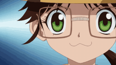 A Close Up Of A Girl With Glasses And A Yellow Hat GIF