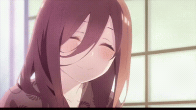 A Close Up Of A Girl With Long Hair Smiling GIF