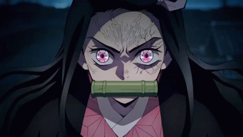 A Close Up Of A Girl With Pink Eyes And A Bamboo Tube In Her Mouth GIF