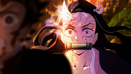 A Close Up Of A Girl With Red Eyes And A Horn On Her Head GIF