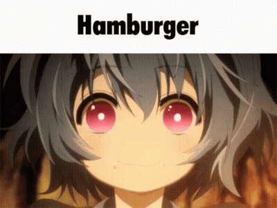 A Close Up Of A Girl With Red Eyes And The Word Hamburger Above Her GIF