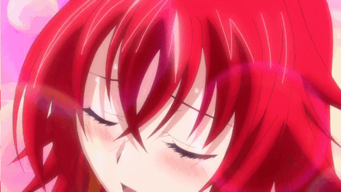 A Close Up Of A Girl With Red Hair GIF