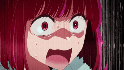 A Close Up Of A Girl With Red Hair Making A Funny Face GIF