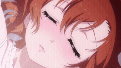 A Close Up Of A Girl With Red Hair Sleeping GIF