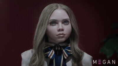 A Close Up Of A Girl With The Name Megan On The Bottom GIF