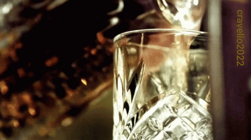 A Close Up Of A Glass With The Year 2022 At The Bottom GIF