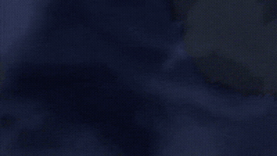 A Close Up Of A Glowing Object In The Dark With A Red Light Coming Out Of It . GIF