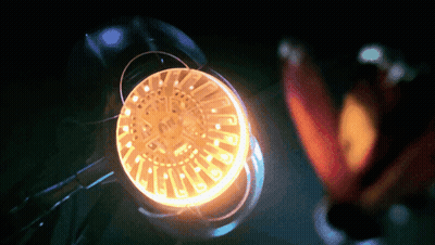 A Close Up Of A Glowing Object With The Letters A And R On It GIF