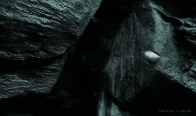 A Close Up Of A Gollum From The Lord Of The Rings Pointing At The Camera With His Finger . GIF