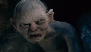 A Close Up Of A Gollum From The Lord Of The Rings With A Very Angry Look On His Face GIF