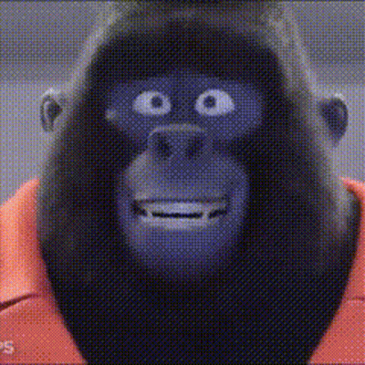 A Close Up Of A Gorilla 'S Face With A Smiley Face . GIF