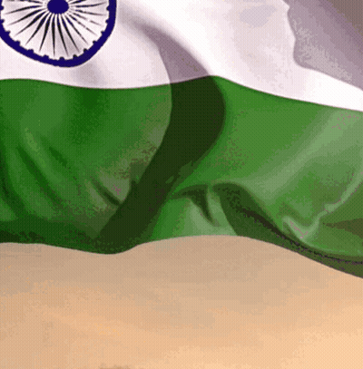A Close Up Of A Green And White Indian Flag Waving In The Wind GIF