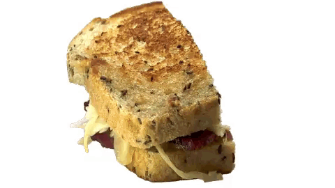 A Close Up Of A Grilled Cheese Sandwich With Meat And Cheese GIF