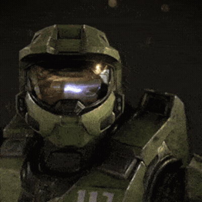 A Close Up Of A Halo Soldier 'S Helmet With A Light Coming Out Of It GIF