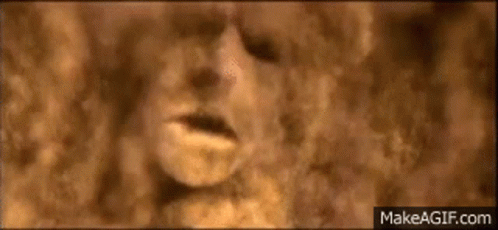 A Close Up Of A Hole In A Wall With A Smoke Coming Out Of It . GIF