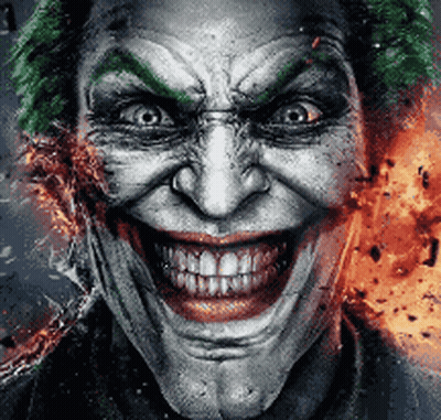 A Close Up Of A Joker 'S Face With A Big Smile GIF