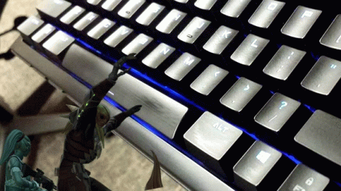 A Close Up Of A Keyboard With The Alt Key In The Middle GIF
