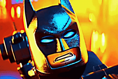 A Close Up Of A Lego Batman 'S Face GIF