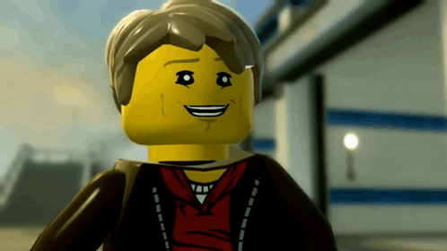 A Close Up Of A Lego Figure Smiling GIF