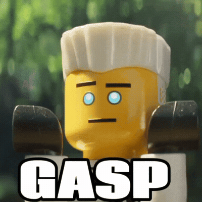 A Close Up Of A Lego Figure With The Word Gasp On The Bottom GIF