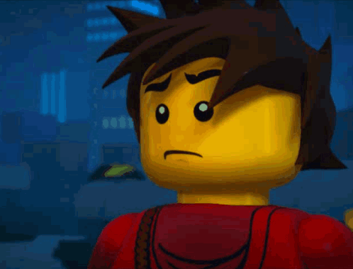 A Close Up Of A Lego Man With A Sad Look On His Face GIF