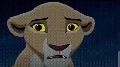 A Close Up Of A Lion 'S Face With A Sad Look On It 'S Face . GIF