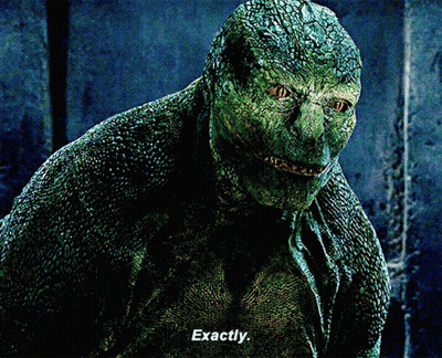 A Close Up Of A Lizard With The Words Exactly Written Below It GIF