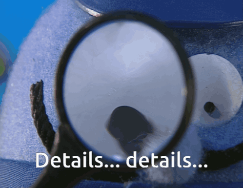 A Close Up Of A Magnifying Glass With The Words Details On The Bottom GIF