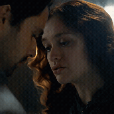 A Close Up Of A Man And A Woman Looking Into Each Other 'S Eyes With The Word Netflix Visible GIF