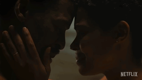A Close Up Of A Man And Woman 'S Faces With The Netflix Logo Visible GIF