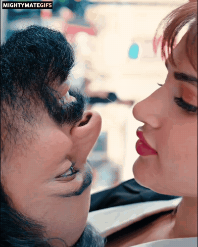 A Close Up Of A Man And Woman 'S Faces With The Words Mightymategifs Above GIF