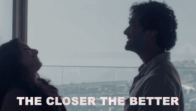 A Close Up Of A Man And Woman With The Words The Closer The Better GIF