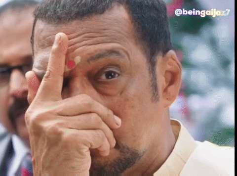 A Close Up Of A Man Covering His Face With His Hand With The Hashtag Beingaljo27 On The Bottom GIF